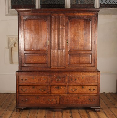 Lot 508 - A George III oak housekeeper's cupboard, of...