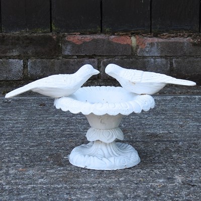 Lot 383 - A painted cast iron bird bath