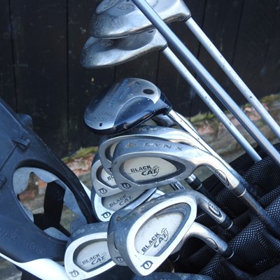 Lot 240 - A set of Calloway golf clubs, together with a...