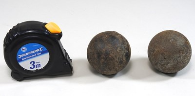 Lot 3 - Two antique iron cannonballs