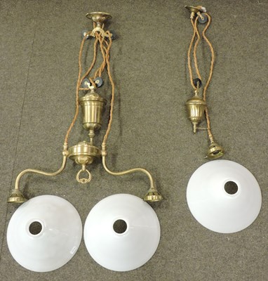 Lot 177 - An early 20th century brass adjustable ceiling light