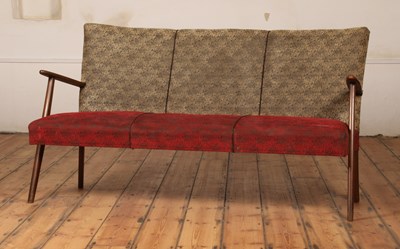 Lot 474 - A Danish three seater sofa, having red and...