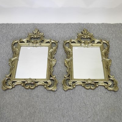 Lot 163 - A pair of ornate gilt framed wall mirrors