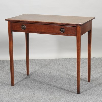 Lot 323 - A George III oak side table