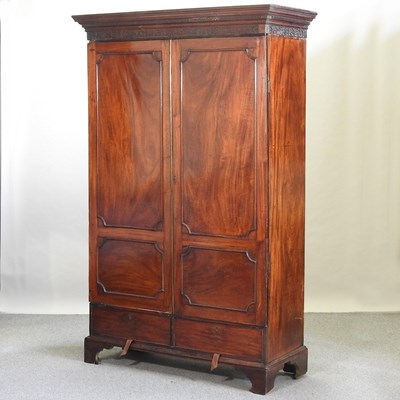 Lot 575 - A 19th century mahogany double wardrobe