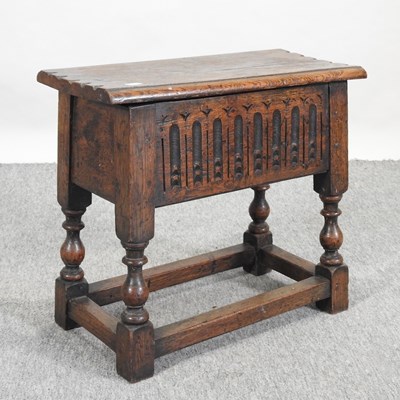 Lot 685 - A Victorian carved oak stool