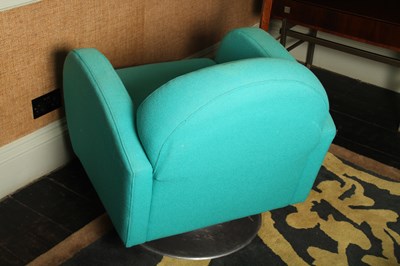 Lot 5 - A pair of 1970's style blue upholstered swivel...