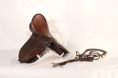 Lot 576 - A leather horse's saddle and bridle (2)