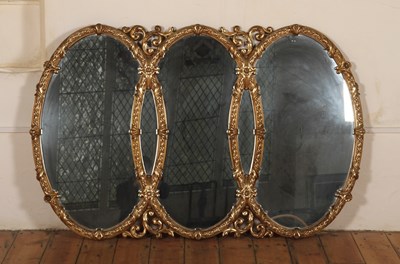 Lot 535 - A gilt framed triple oval mirror