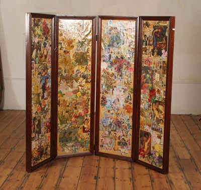Lot 548 - A decoupage four fold dressing screen