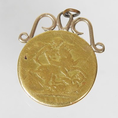 Lot 41 - A George V sovereign, mounted in 9 carat gold...