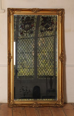 Lot 585 - A rectangular gilt framed wall mirror