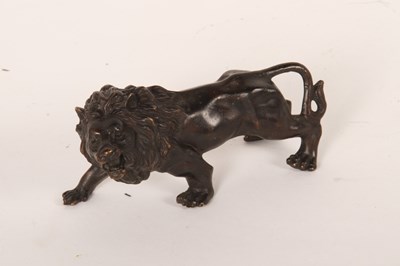 Lot 281 - A bronze model of a lion