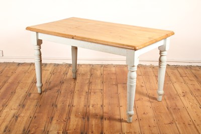 Lot 527 - A pine kitchen table with painted legs