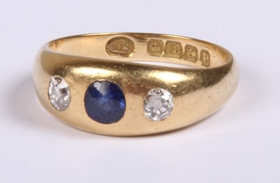 Lot 245 - An 18 carat yellow gold sapphire and diamond...
