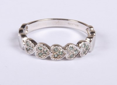Lot 238 - A 9 carat white gold alexandrite heart set...