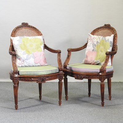 Lot 661 - A pair of early 20th century Louis XVI style armchairs