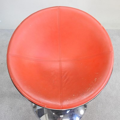 Lot 16 - A half moon swivel lounge chair, on a metal...