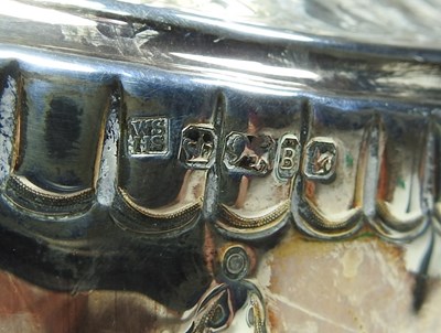 Lot 6 - A Victorian silver teapot, of oval shape with...