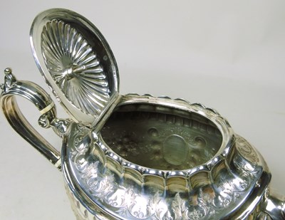 Lot 6 - A Victorian silver teapot, of oval shape with...