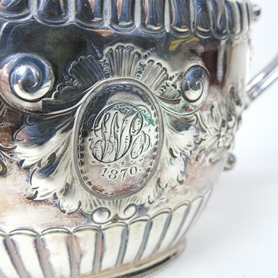 Lot 6 - A Victorian silver teapot, of oval shape with...