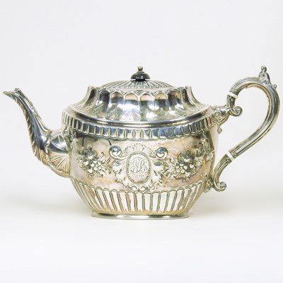 Lot 6 - A Victorian silver teapot, of oval shape with...