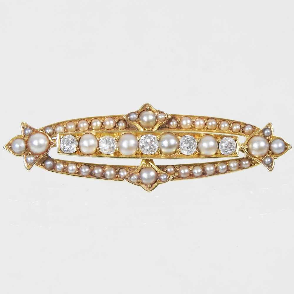 Lot 17 - A 15 carat gold, diamond, and seed pearl...