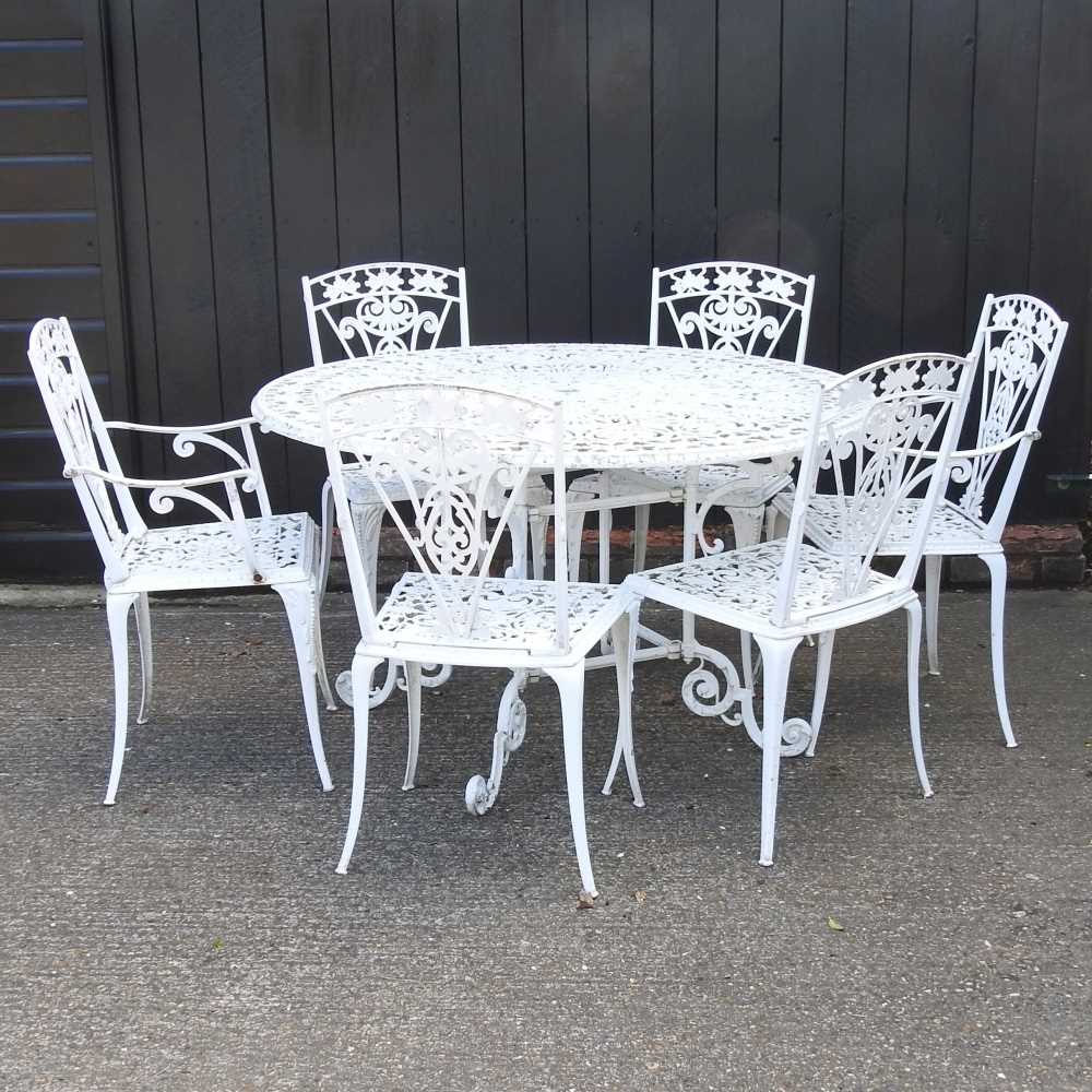 Lot 9 - A white painted aluminium garden table, of...
