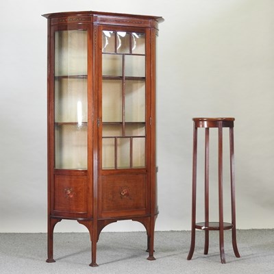 Lot 663 - An Edwardian mahogany display cabinet