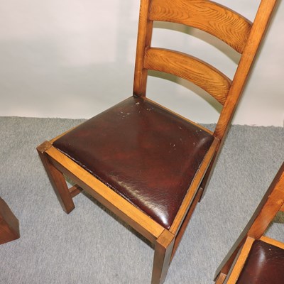 Lot 665 - A modern oak dining table