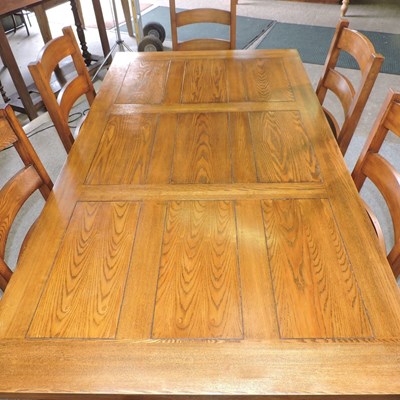 Lot 665 - A modern oak dining table