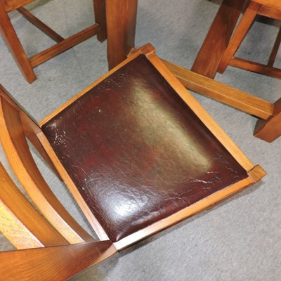 Lot 665 - A modern oak dining table