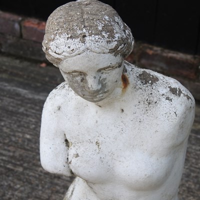 Lot 21 - A painted cast stone garden statue of Venus,...