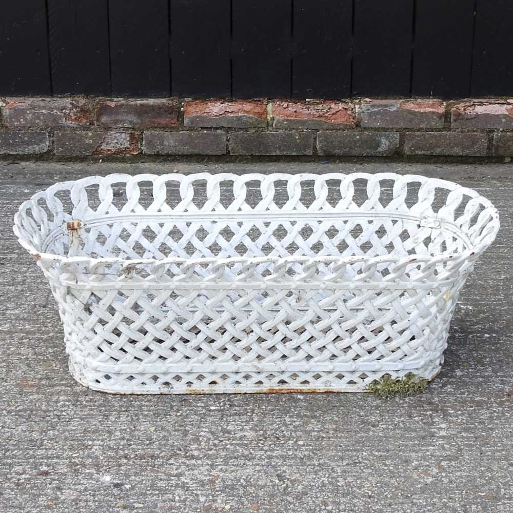 Lot 15 - A white painted cast iron garden trough, of...