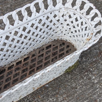 Lot 15 - A white painted cast iron garden trough, of...