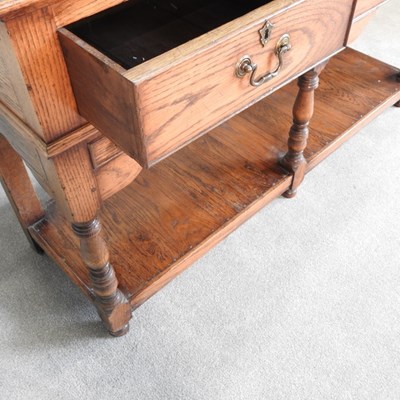 Lot 11 - An oak dresser base, of 18th century design,...