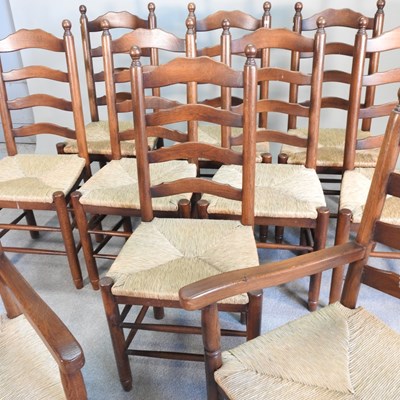 Lot 35 - A set of ten oak ladderback dining chairs,...