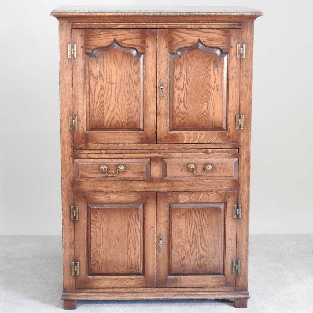 Lot 37 - An oak cabinet, of 18th century style, in the...