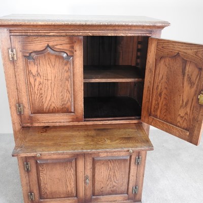 Lot 37 - An oak cabinet, of 18th century style, in the...
