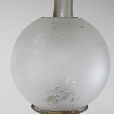 Lot 28 - A 19th century brass oil lamp, in the form of...