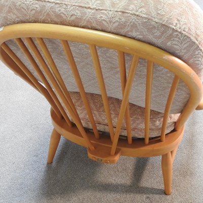 Lot 20 - A 1970s Ercol light elm Windsor armchair, with...