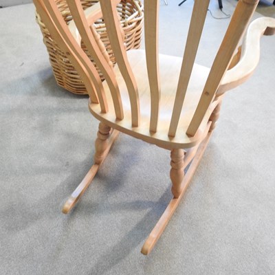 Lot 254 - A beech splat back rocking chair, together...