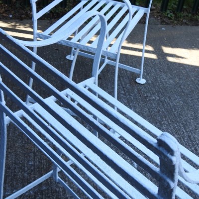 Lot 1 - A pair of Regency style white painted wrought...