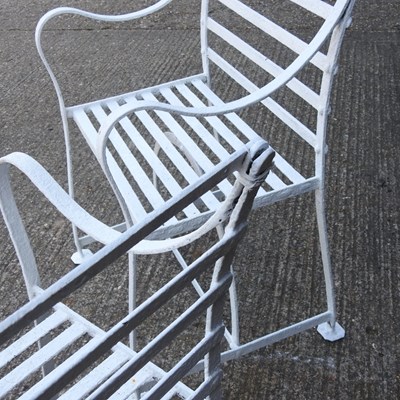 Lot 1 - A pair of Regency style white painted wrought...