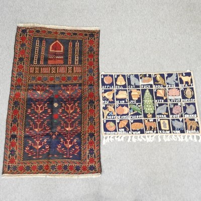 Lot 285 - A woollen prayer rug