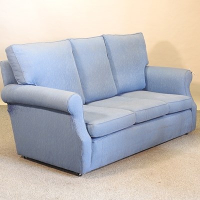 Lot 586 - A modern blue upholstered three seater sofa