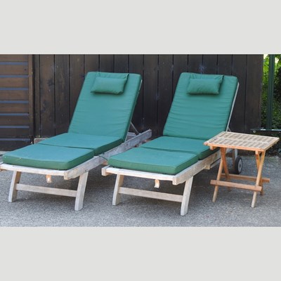 Lot 308 - A pair of teak garden loungers