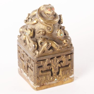 Lot 508 - A Chinese gilt metal desk seal, surmounted by...
