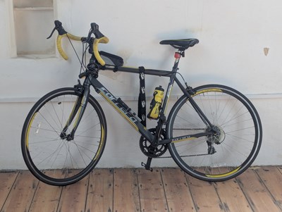 Lot 585 - A gent's Carrera racing bike, with 23 inch wheels