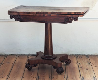 Lot 516 - An early 19th century mahogany card table,...
